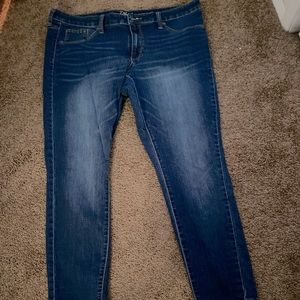 Skinny jeans. Dark wash with faded thighs. High waist